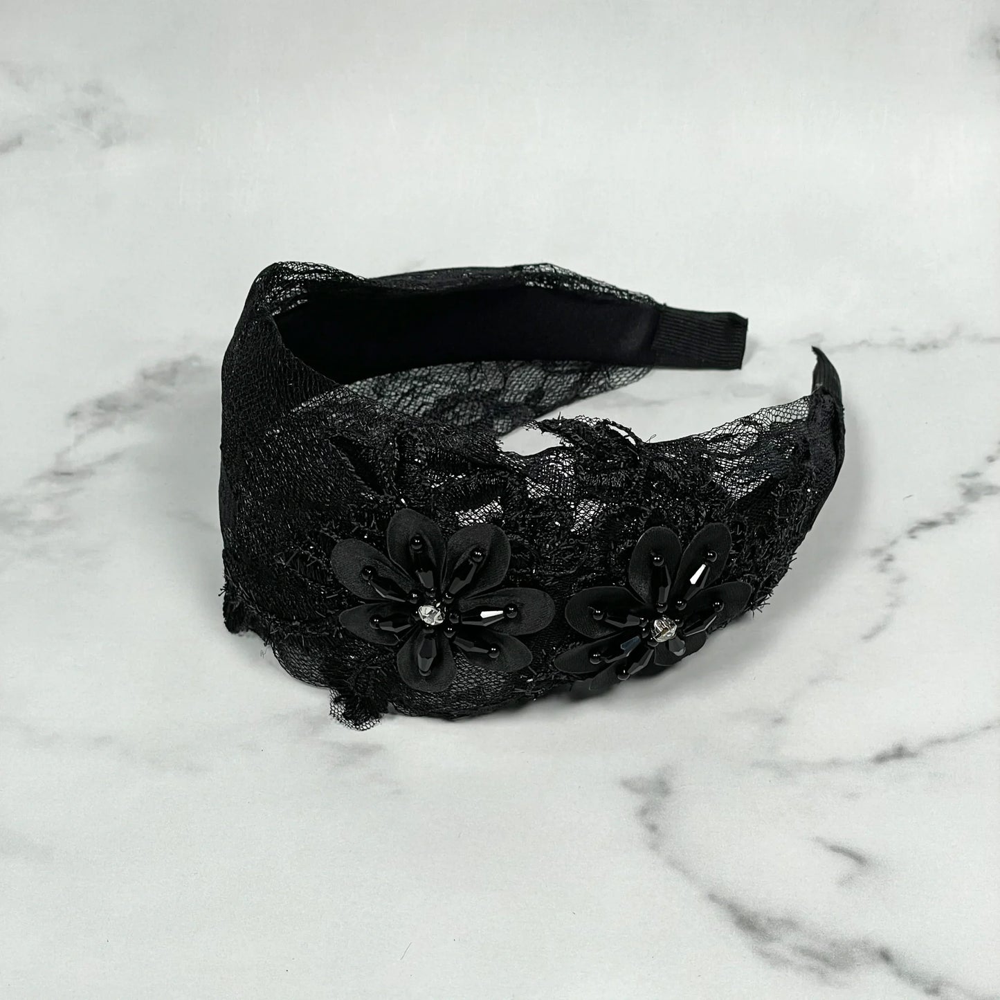 Black lace broad flower hairbands adorned with floral appliques and rhinestones by mydevelopmentstor
