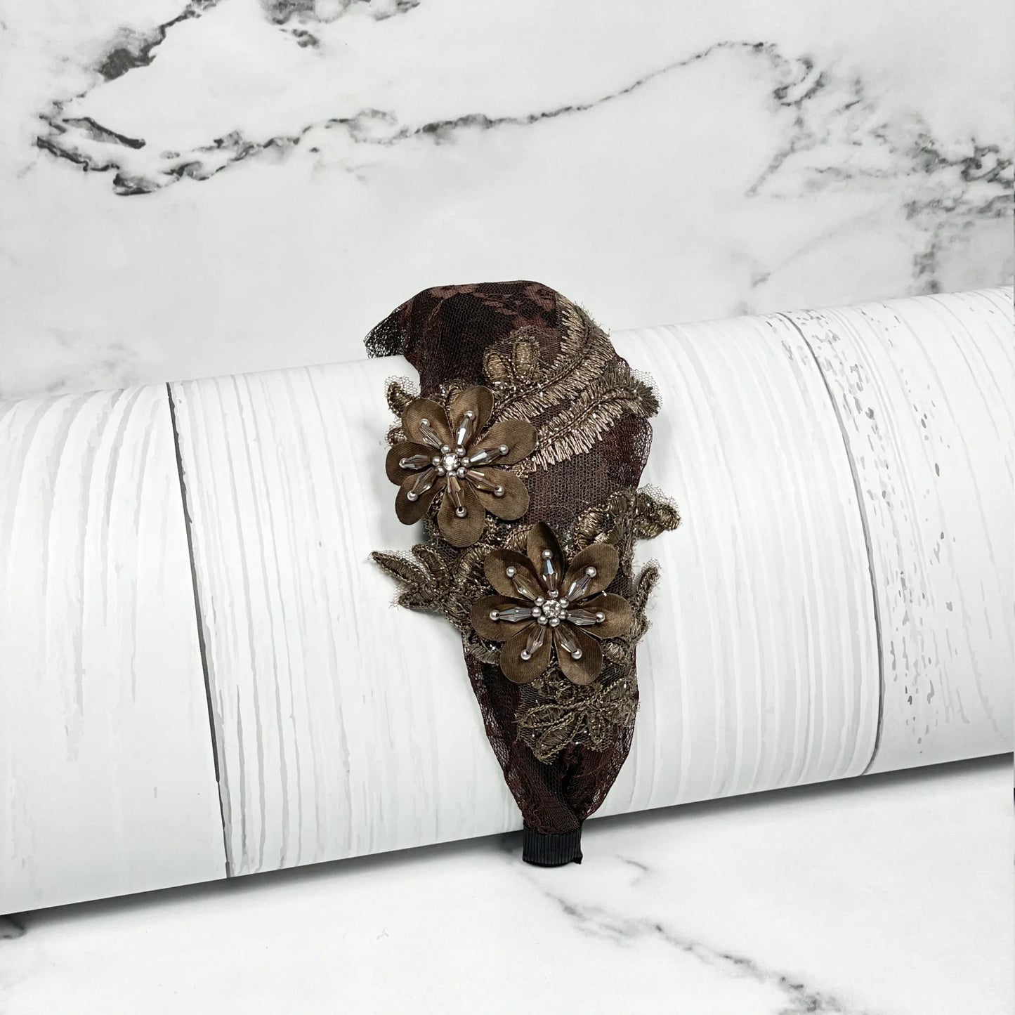 Brown broad flower hairbands with decorative floral designs and lace details from mydevelopmentstor