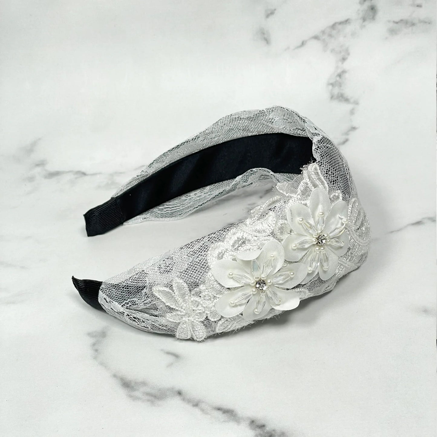 Elegant white lace broad flower hairbands with floral embellishments and rhinestone accents