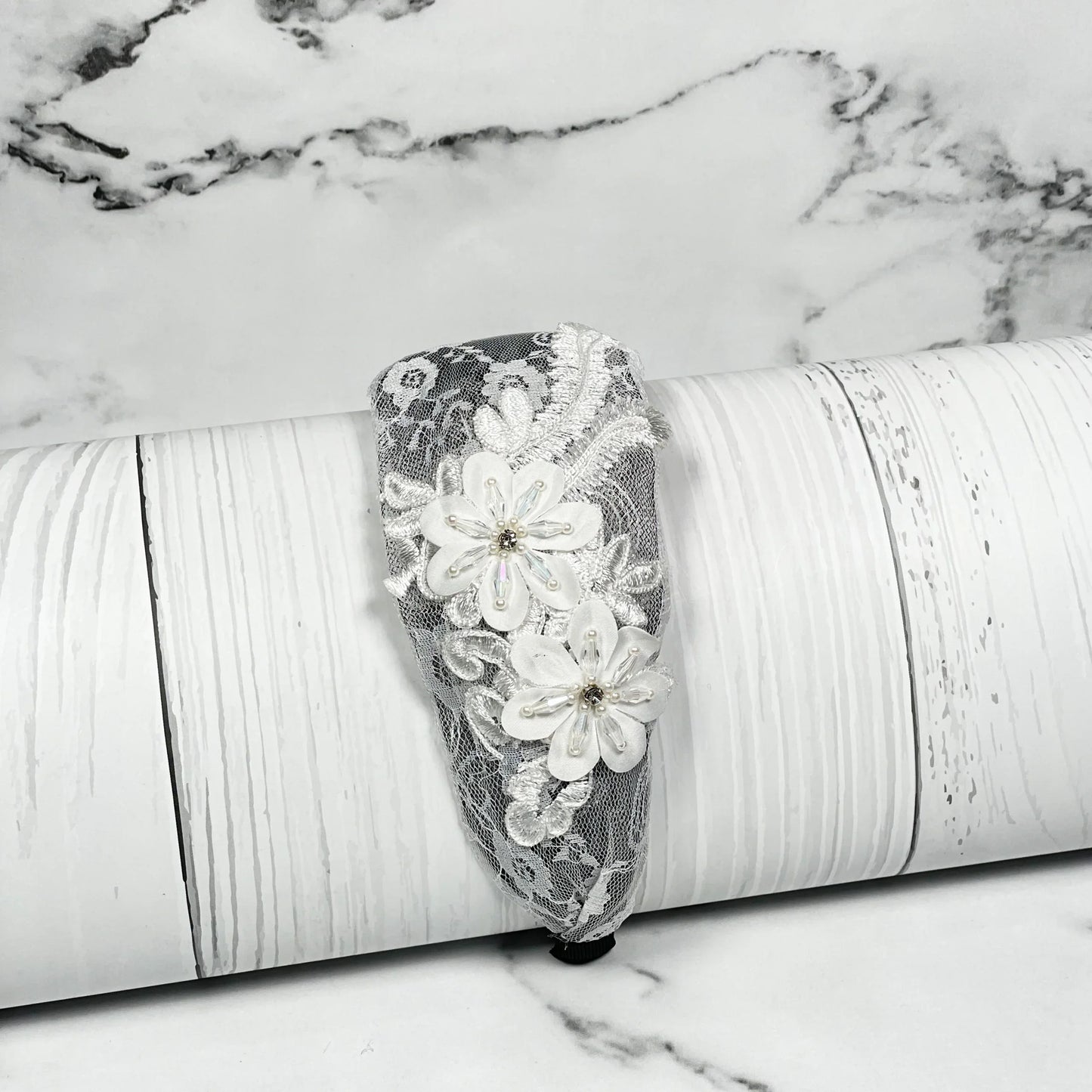 Elegant broad flower hairbands with white lace and floral embellishments for stylish hair accessories