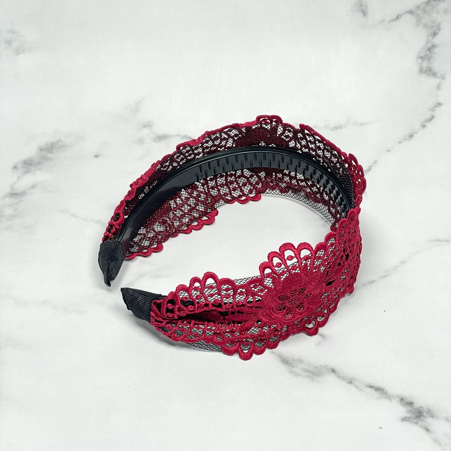 Burgundy broad lace hairbands with intricate floral pattern and plastic inner teeth for secure fit