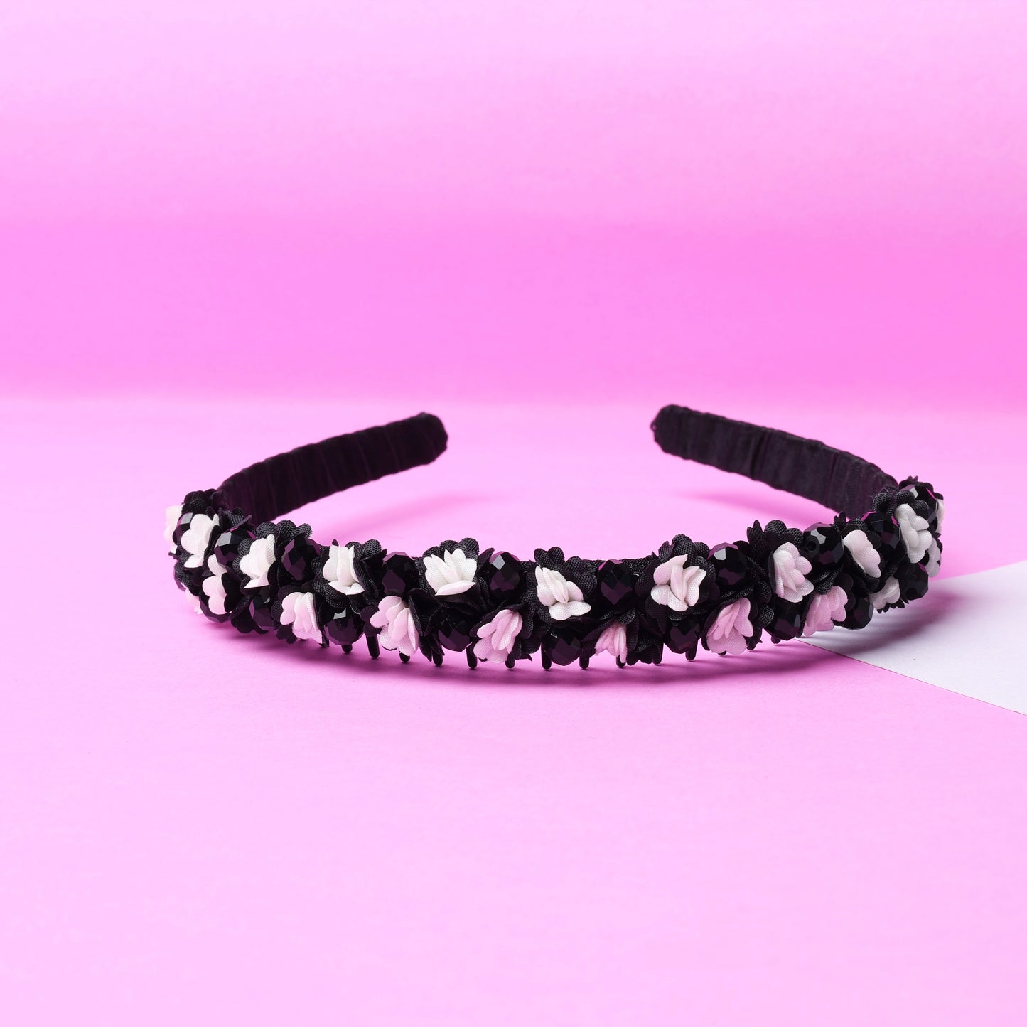 Black hairband decorated with white flowers and crystals crystal flower studded hairbands