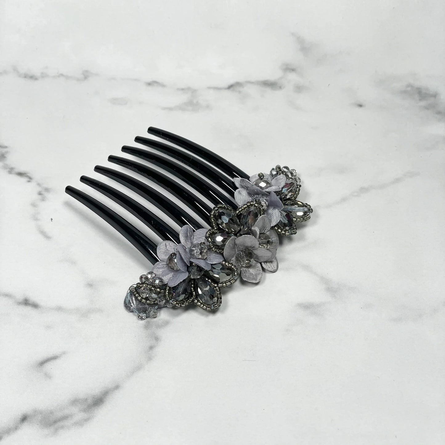 Black hair comb with purple flowers and crystal studded comb clips for elegant hair styling