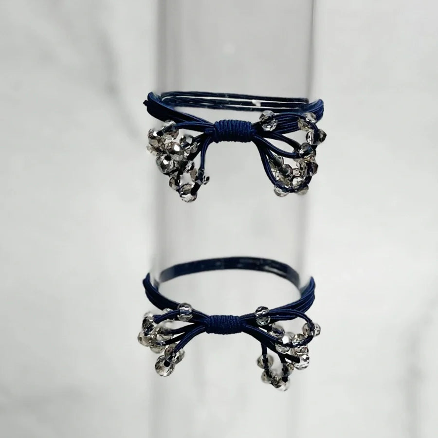 Blue crystal studded hair ties bow with sparkling beads for stylish hair accessories