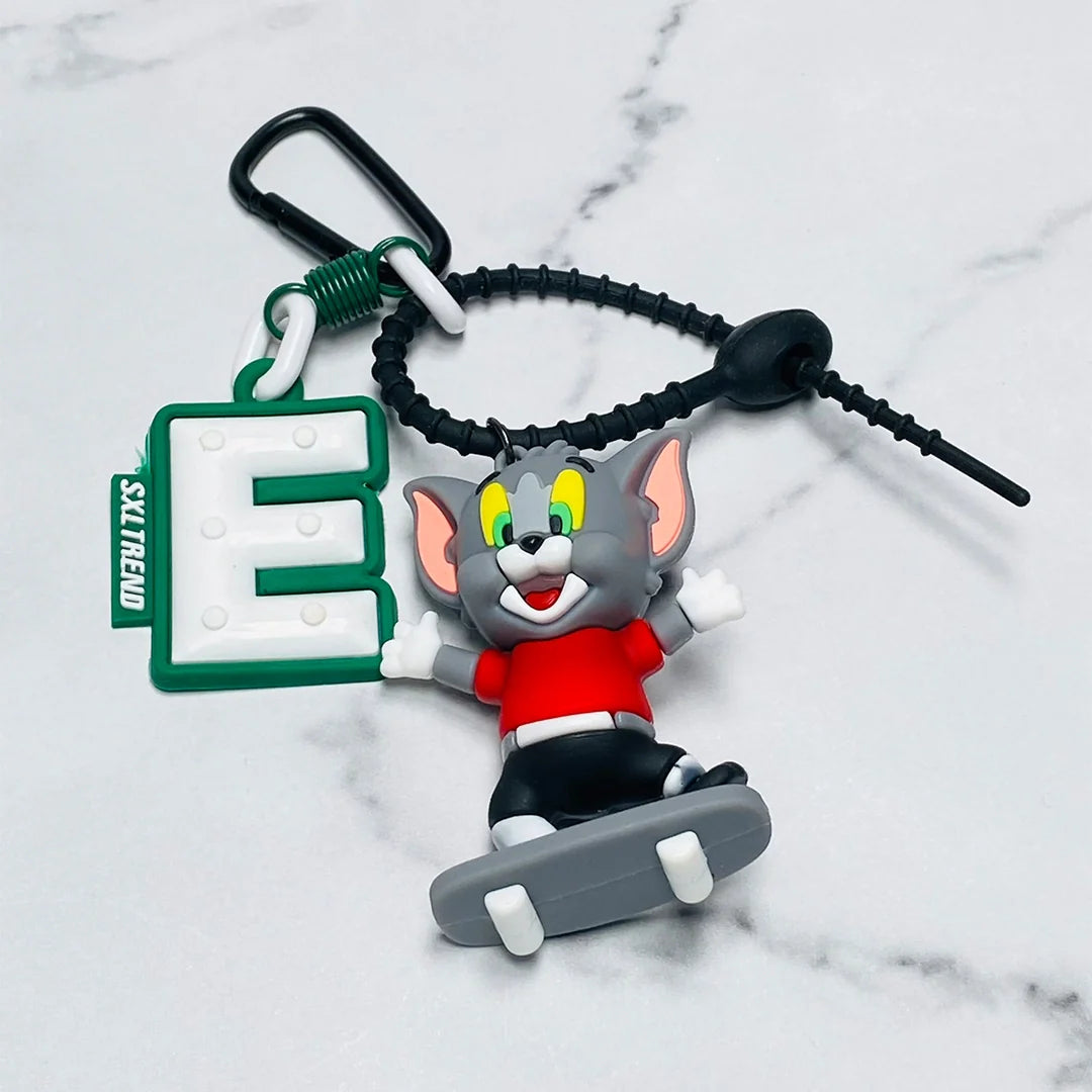 Disney bag tag featuring a cartoon mouse character with skateboard and keyring attachment