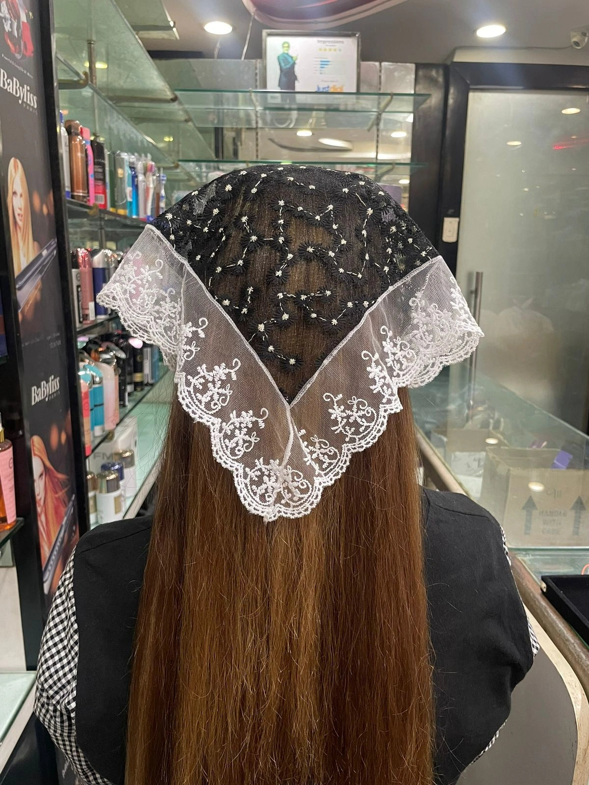 Bella Luxe Embroidered Shimmery Lacy Bandana in black with white lace worn on long brown hair