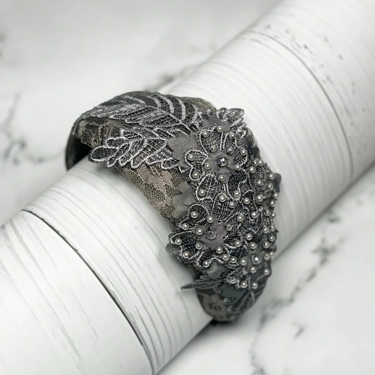 Elegant floral lacy hairbands with cutwork in dark gray adorned with beads and intricate embroidery