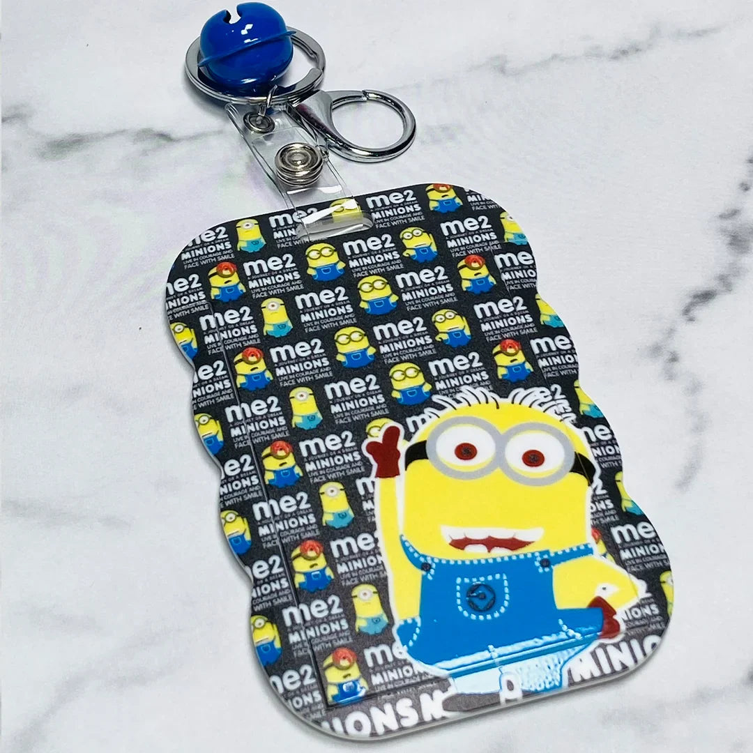 Minions key chains with name tags featuring a colorful design and secure metal ring attachment