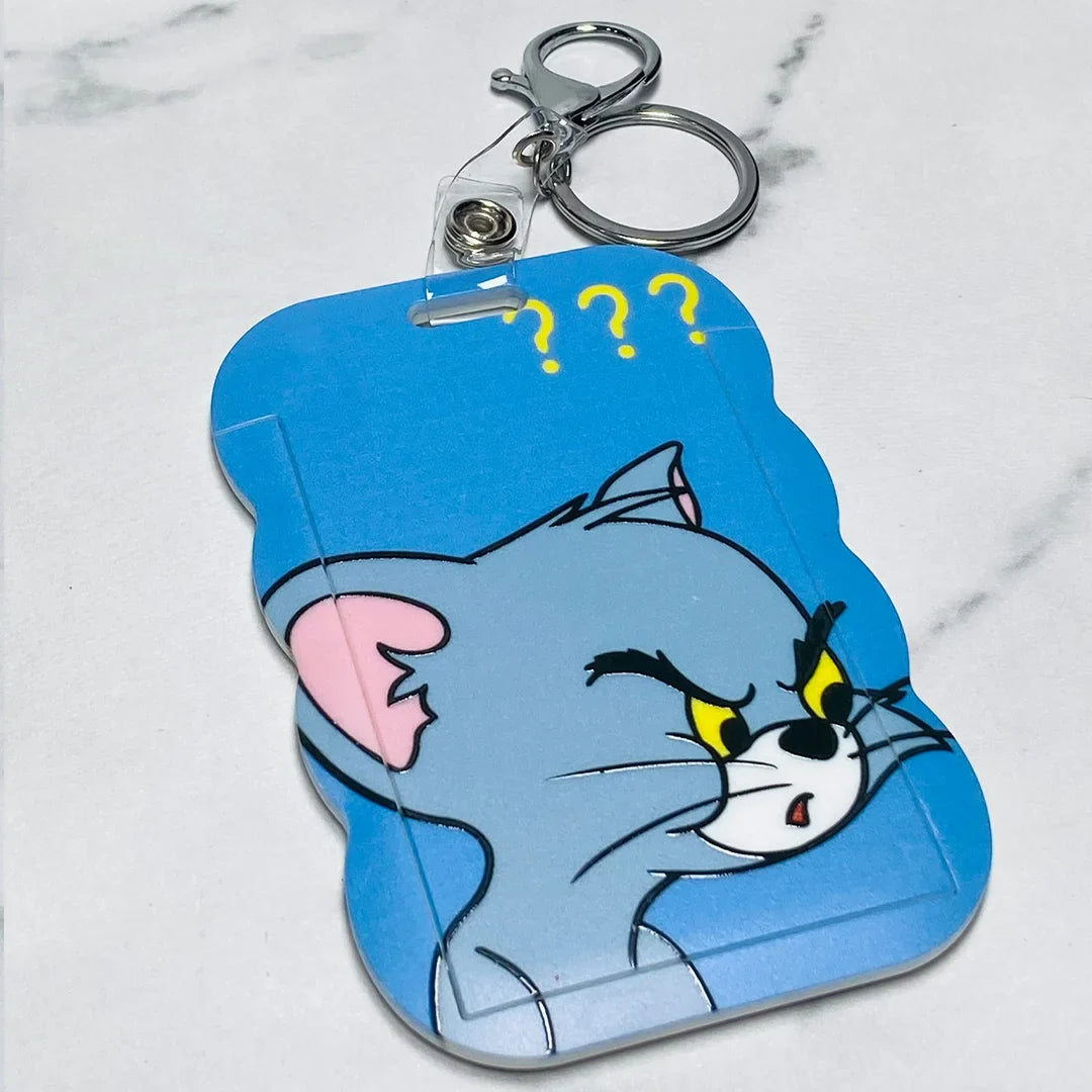Blue Tom cat shaped key chains with name tags featuring a confused expression and metal keyring