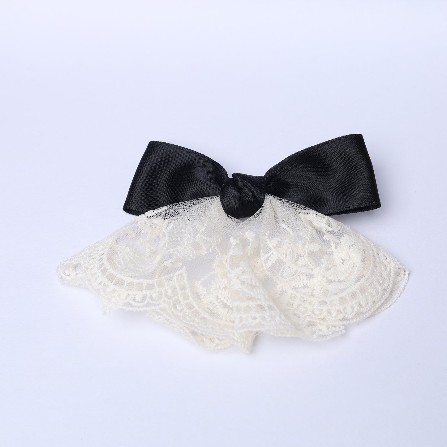 Lacy bow frill alligator clip with black satin bow and white lace frill accessory