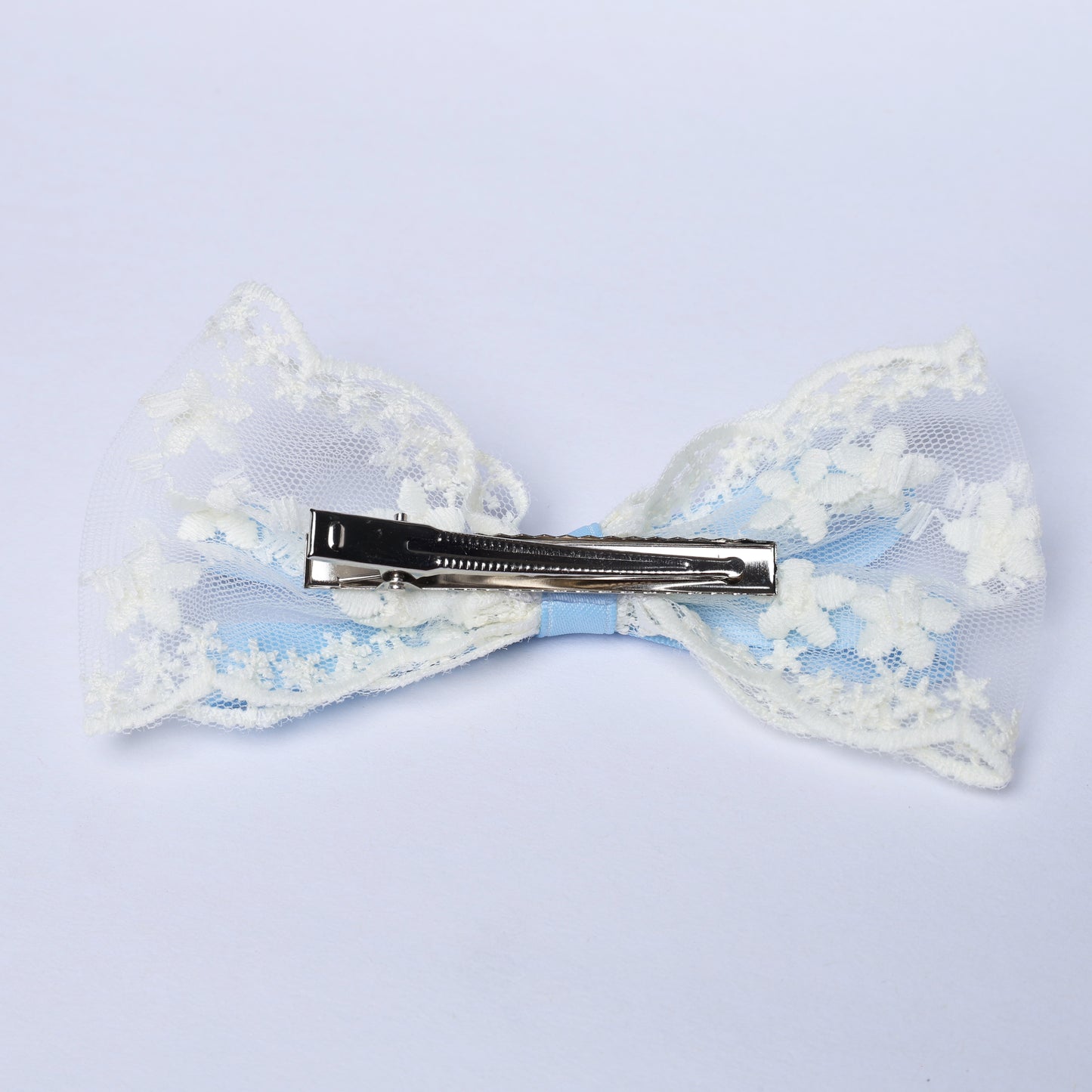 White Lacy Bows with Ribbon hair clip featuring delicate floral lace and a metal clasp