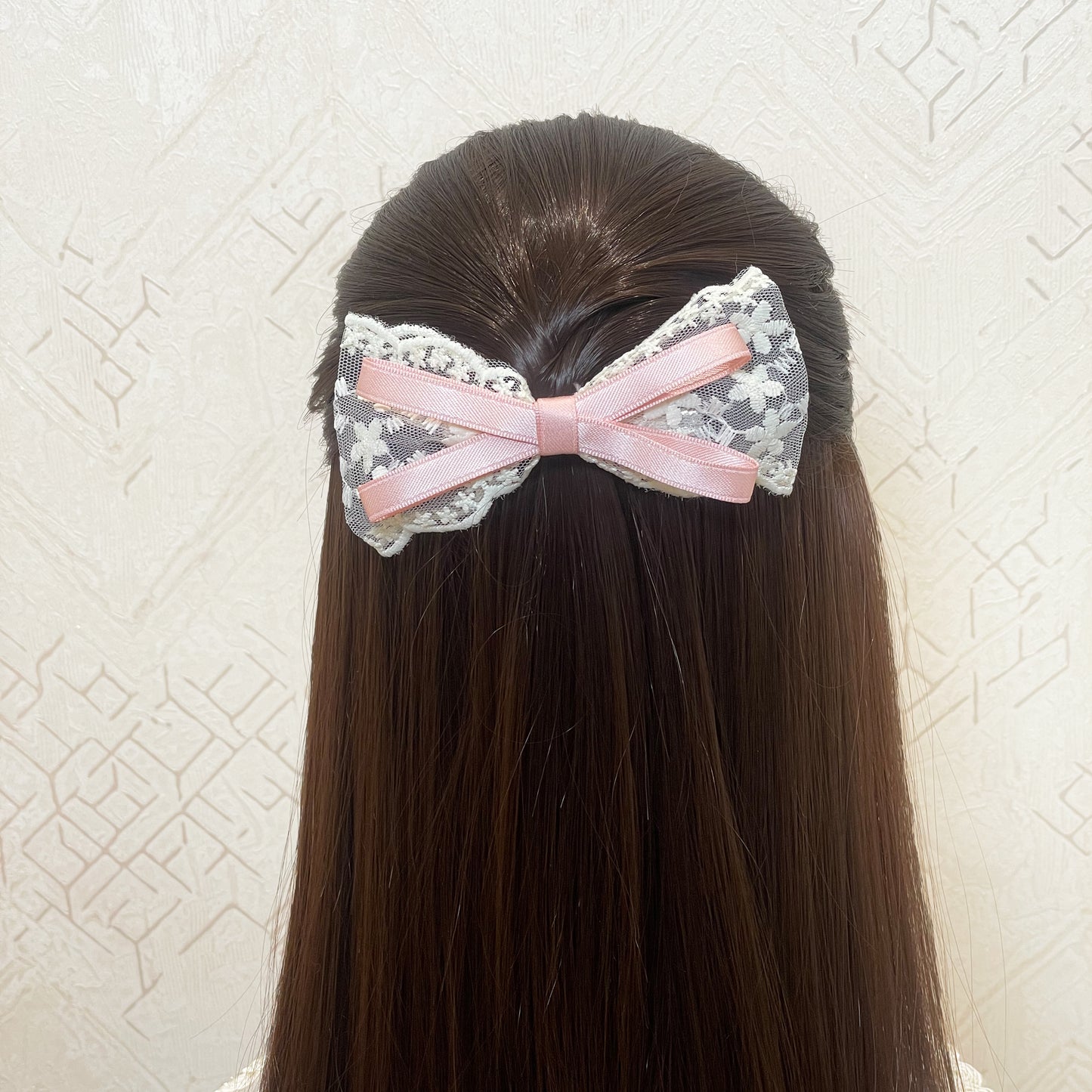 Lacy Bows with Ribbon in pink and white lace worn on long straight brown hair