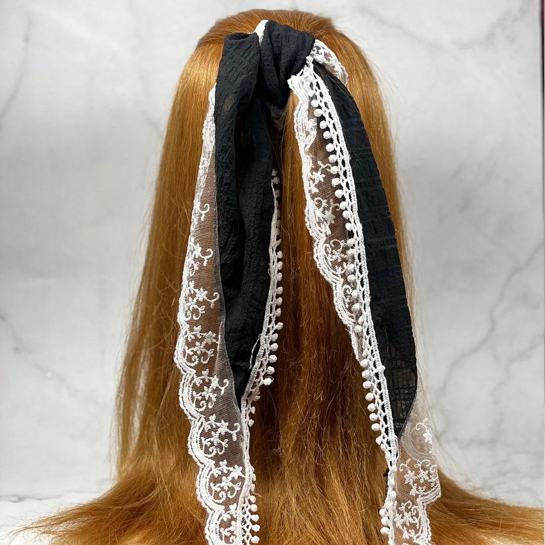 Lacy Georgette Hair Scarf in black with white lace detail tied on long brown hair