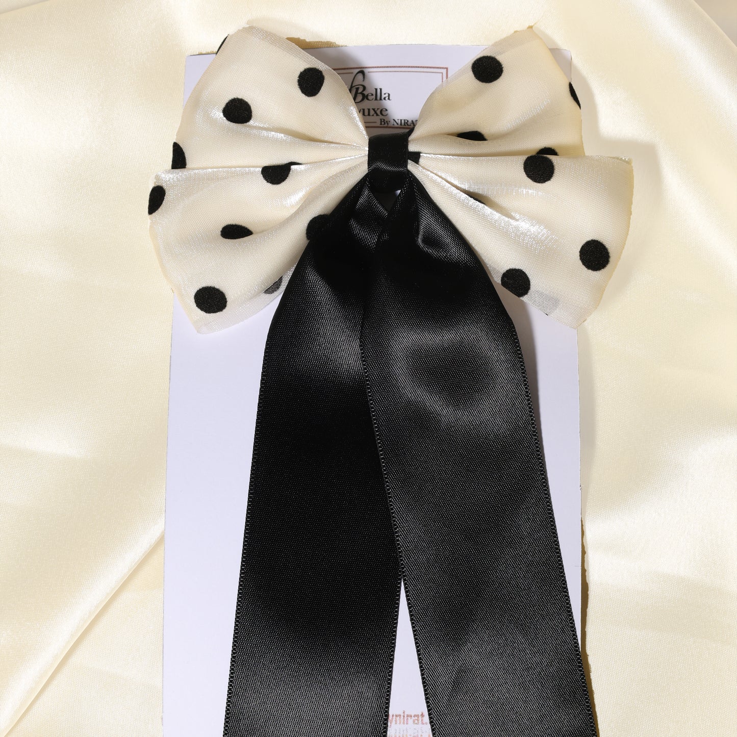 Bella Luxe Polka Dot Bow Clips with white and black satin fabric and long black ribbons