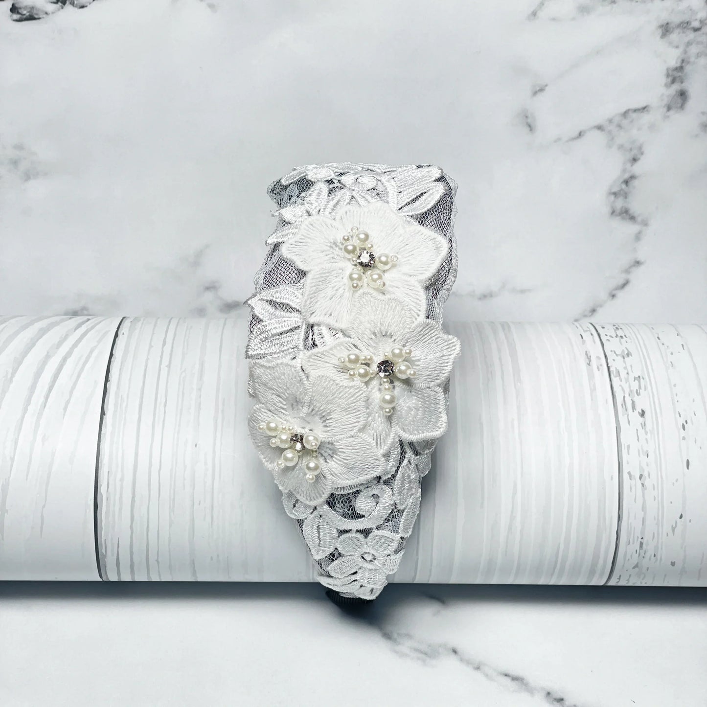 Three flower broad hairbands with white lace and pearl accents for elegant styling