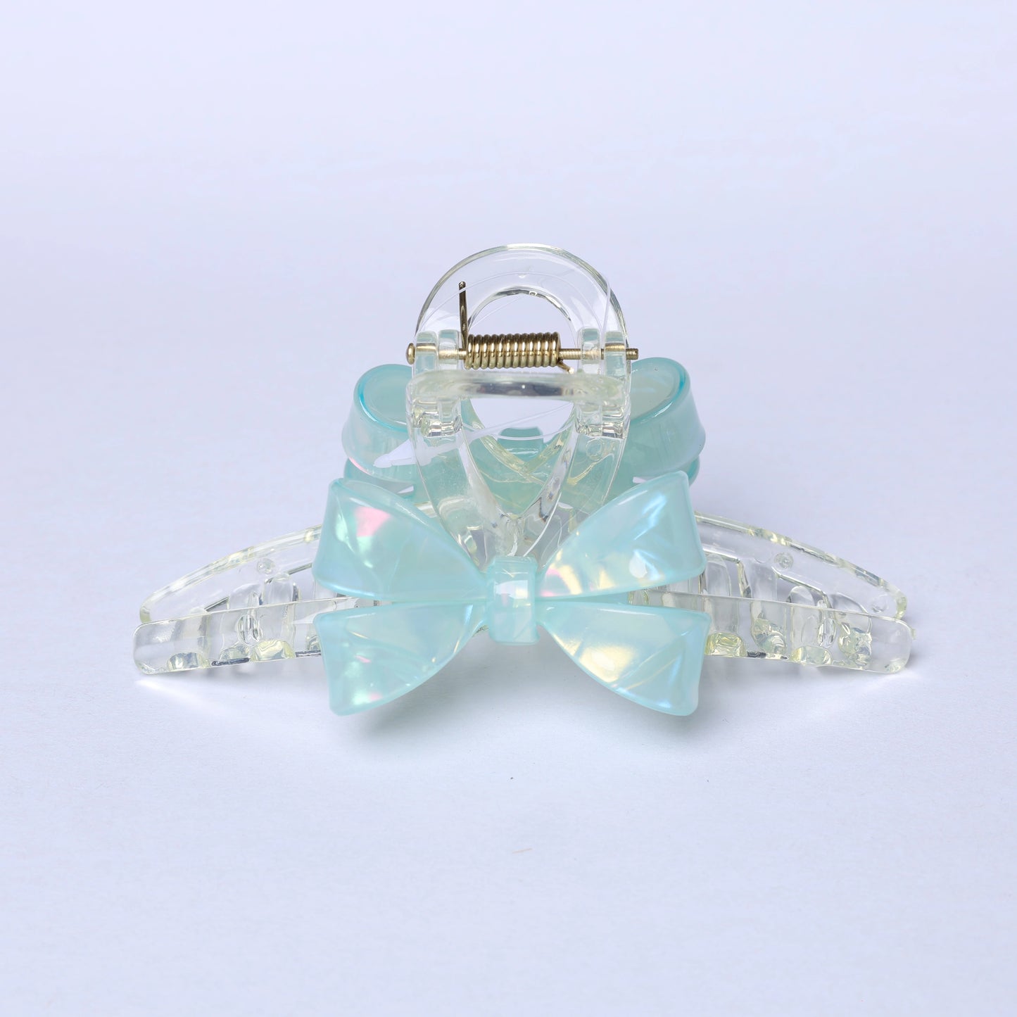 Clear plastic hair clutch with a light blue bow decorative detail bow hair clutches