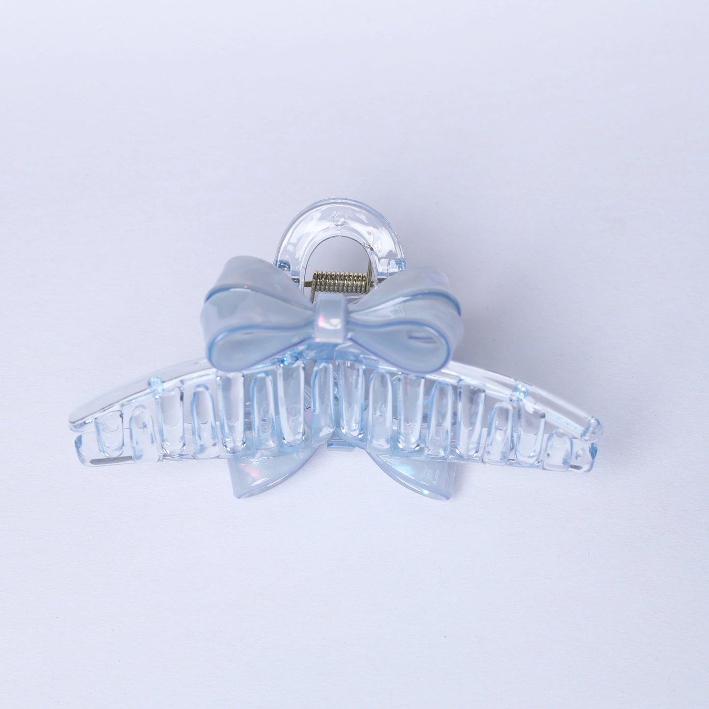 Clear blue bow hair clutches clip with glossy finish for stylish hair hold