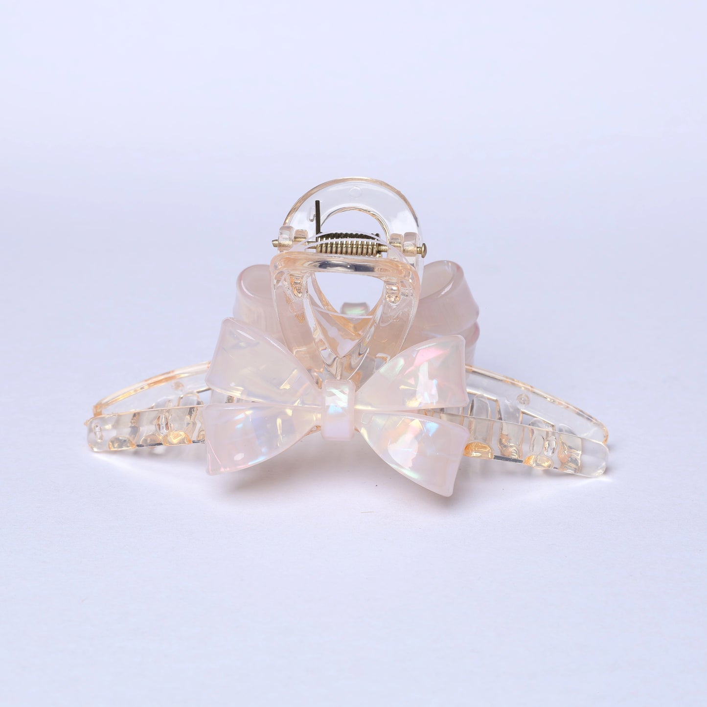 Iridescent bow hair clutches with transparent plastic design for stylish hair accessories