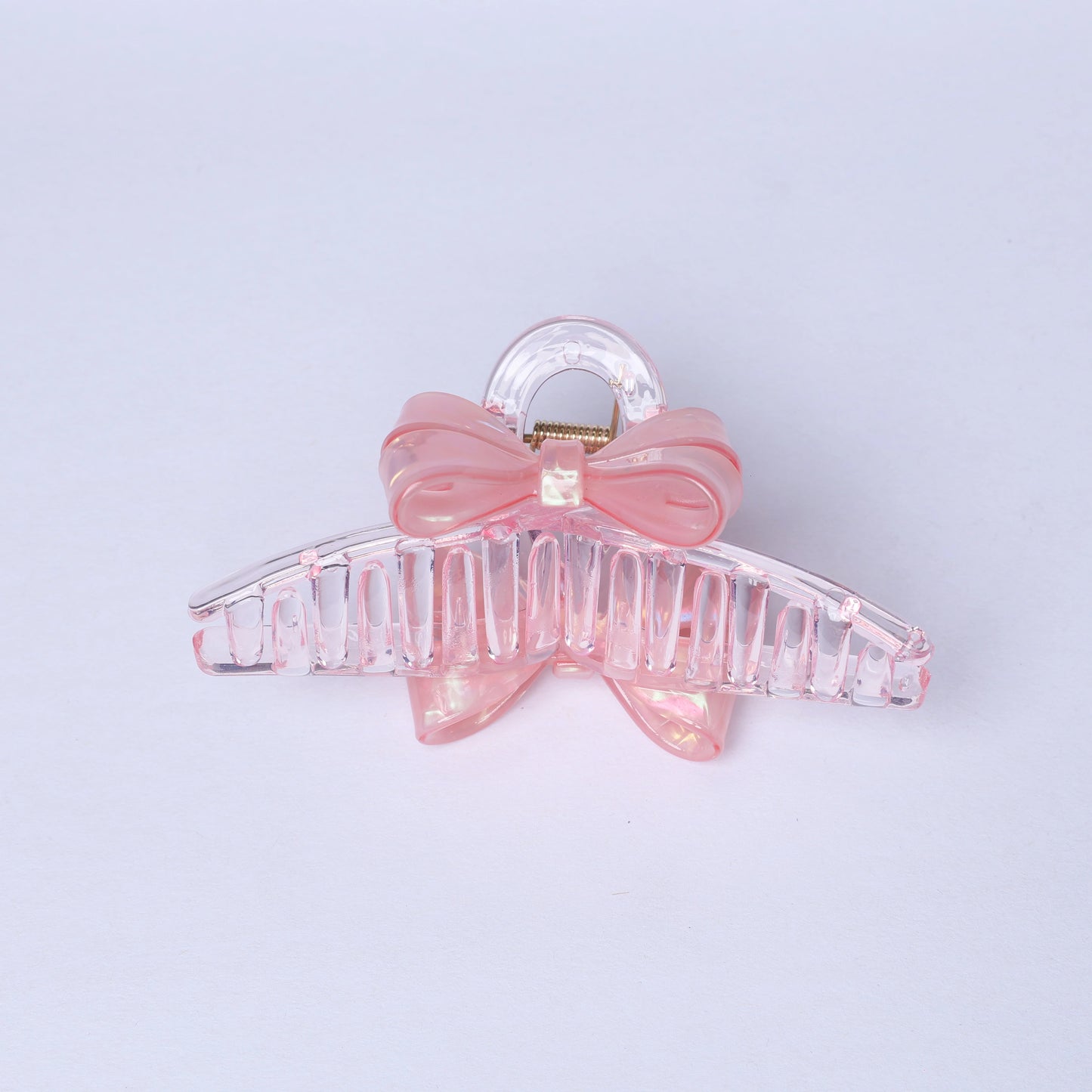 Pink bow hair clutches with clear plastic claw clip for stylish hair hold