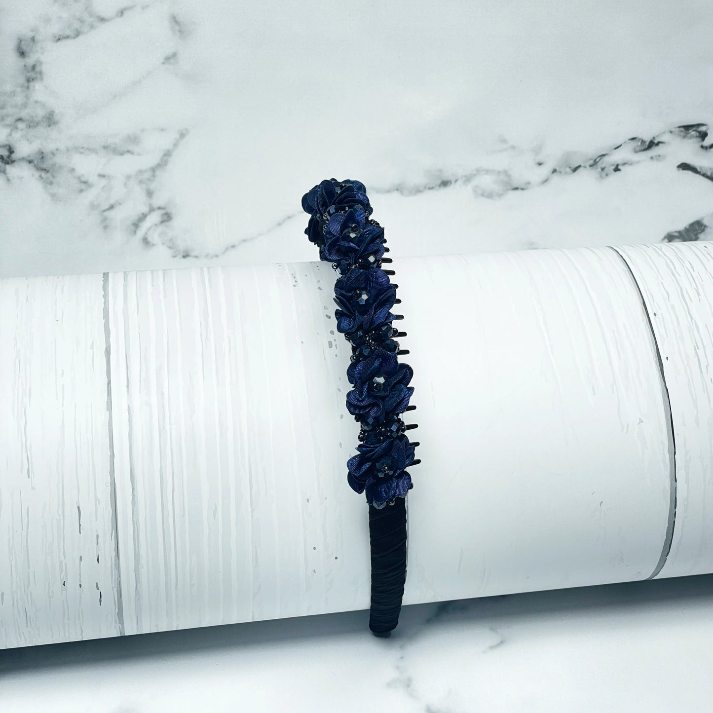 Elegant navy blue Crystal Studded Floral Hairbands featuring delicate fabric flowers and sparkling crystals
