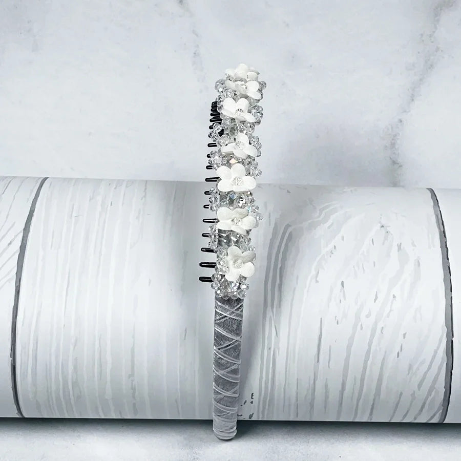 Silver embellished headbands for women decorated with white flowers and clear beads