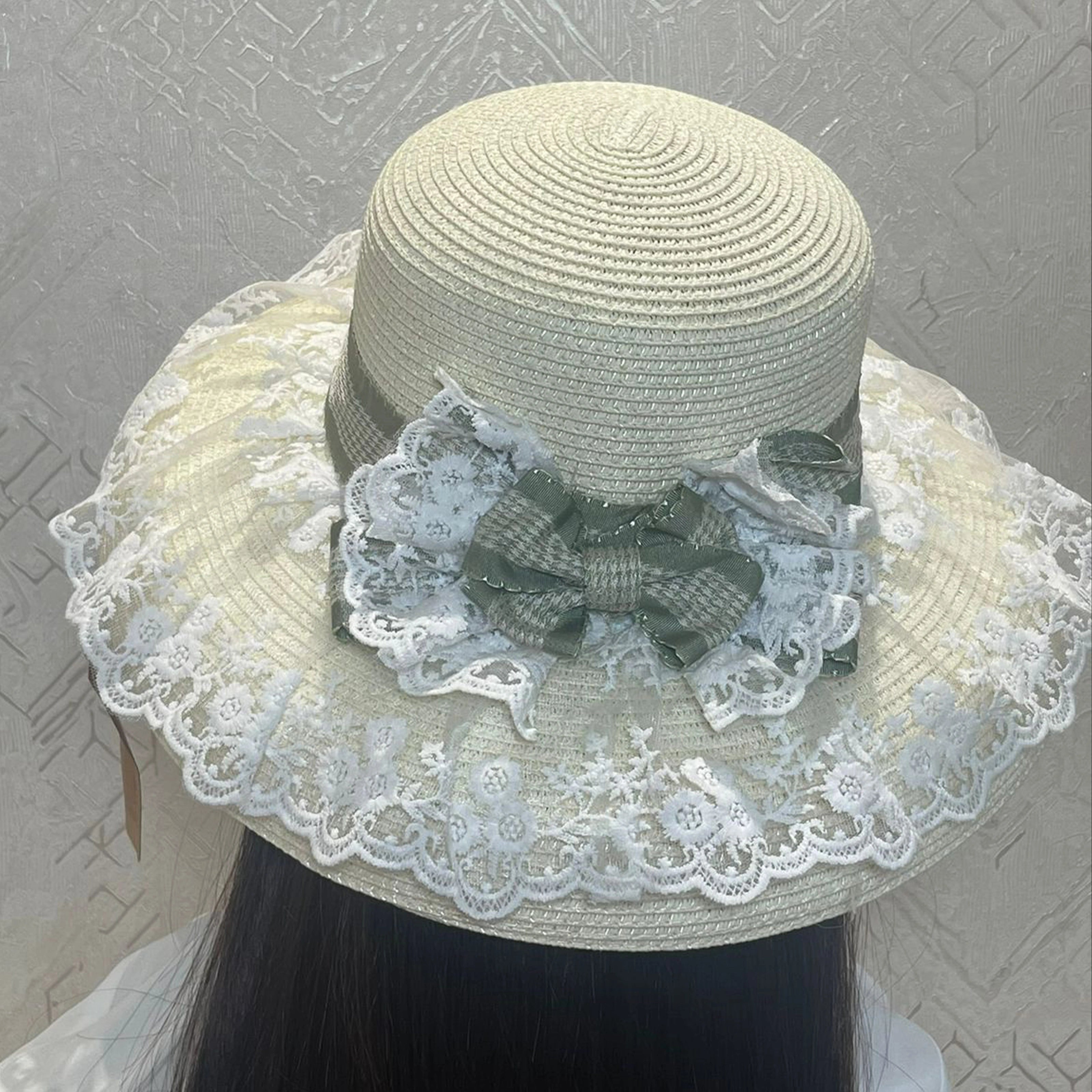 Cream Straw Hat with Lacy Frill and Green Bow Ribbon