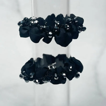 Blue crystal studded hair ties with sparkling decorative beads perfect for stylish hair accessorie