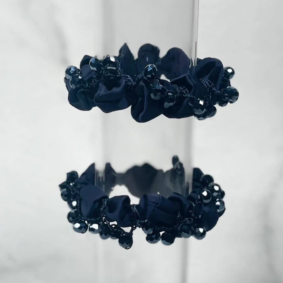 Black crystal studded hair ties with shiny decorative beads for stylish hair accessories