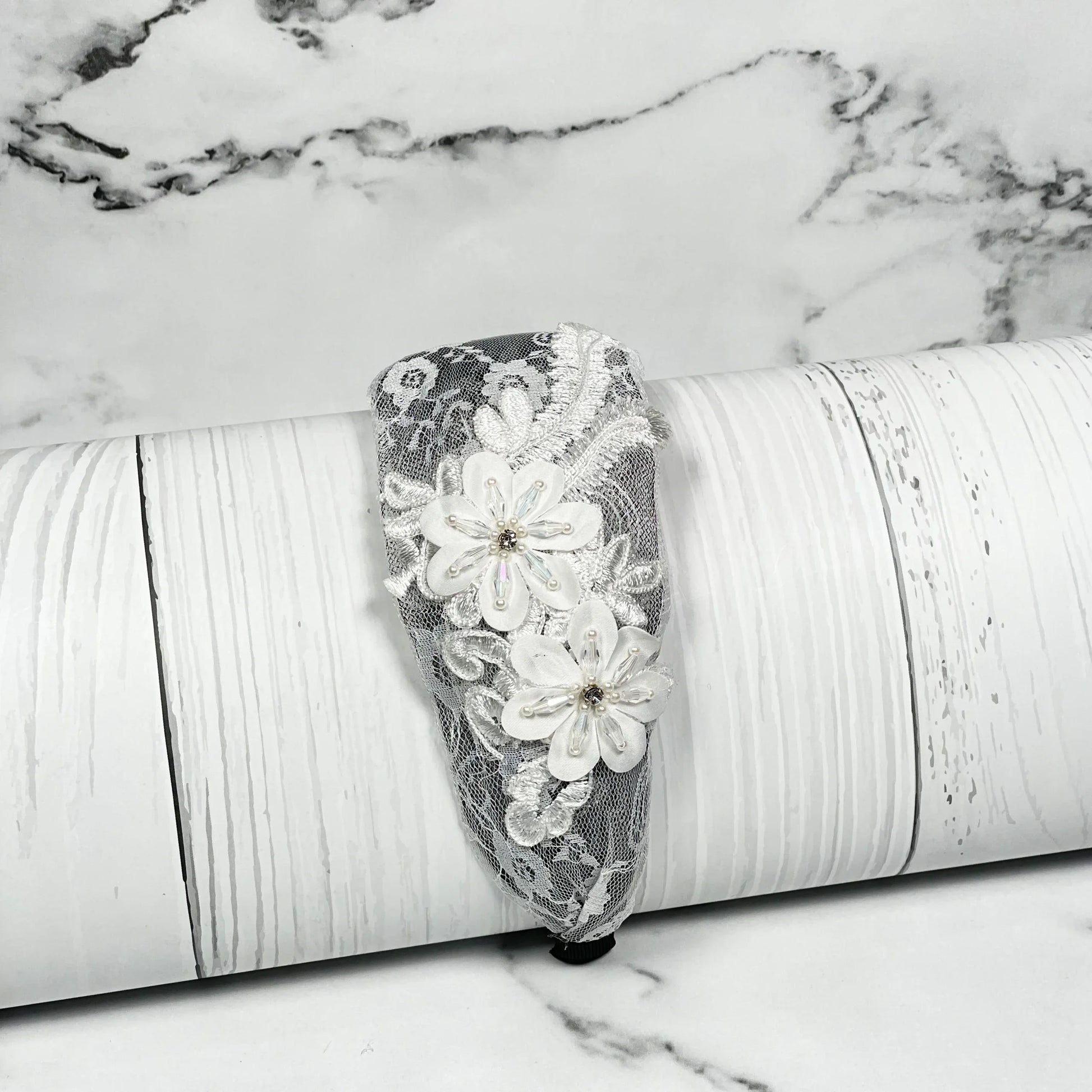 Elegant broad flower hairbands with white lace and floral embellishments for stylish hair accessories