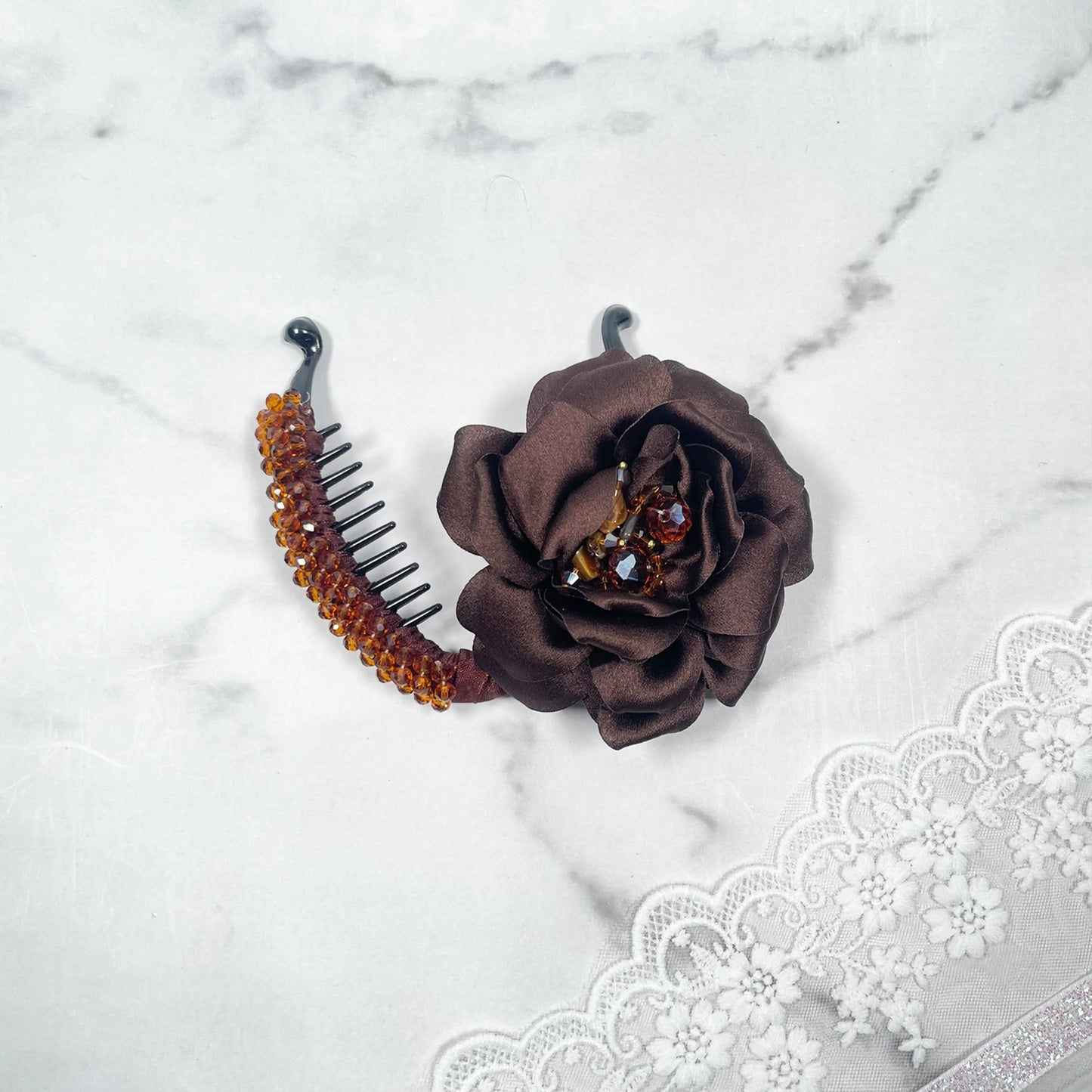 Bella Luxe brown flower crystal banana clip with decorative beads and fabric flower accessory