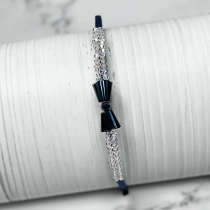 Elegant crystal bow hairbands featuring sparkling crystals and black bow detail for stylish wear