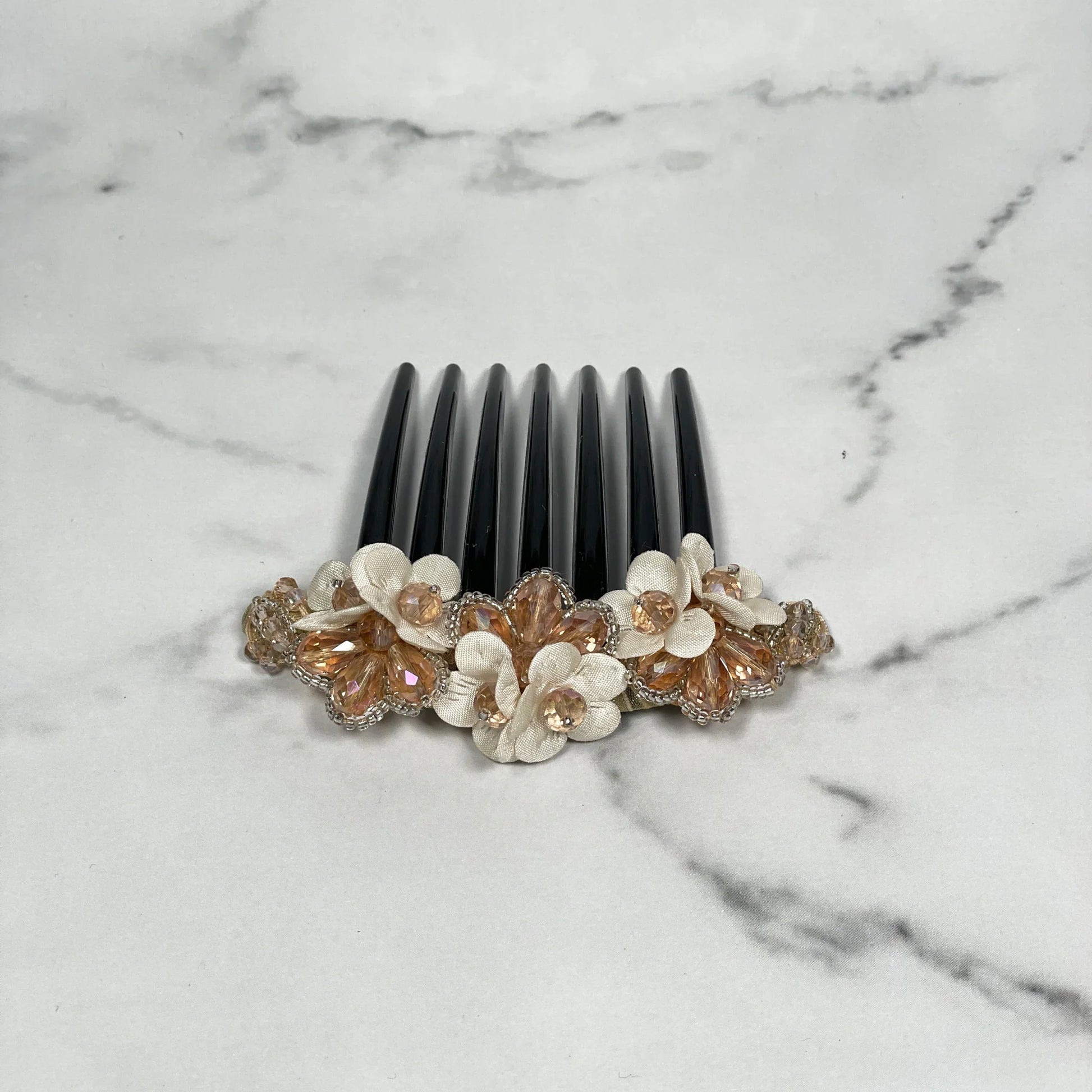 Black comb clip decorated with floral design and crystal studded comb clips for elegant hairstyles