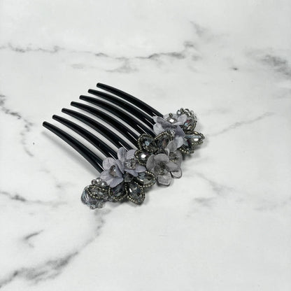 Black hair comb with purple flowers and crystal studded comb clips for elegant hair styling