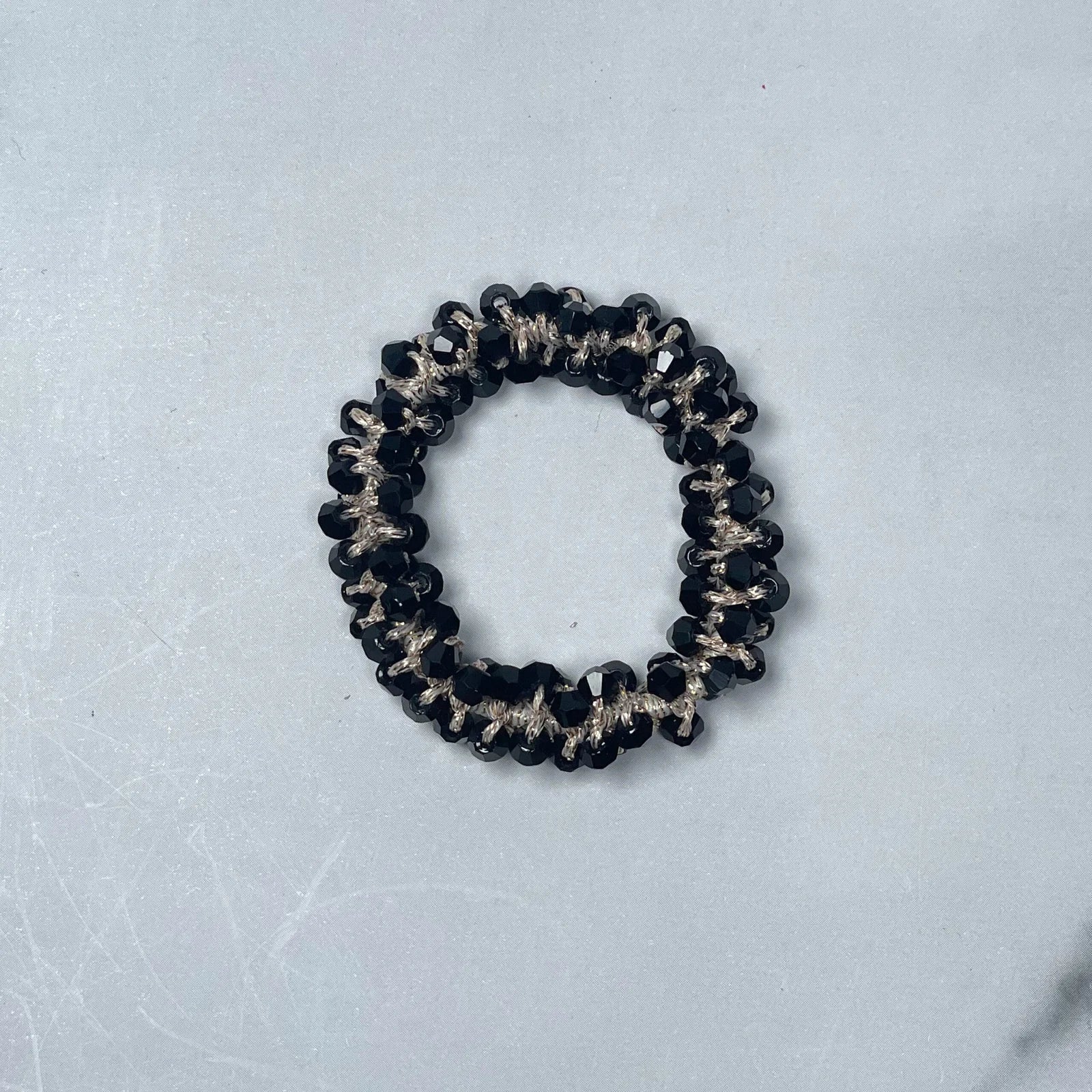 Black crystal studded hair ties with shiny beads for stylish hair accessories