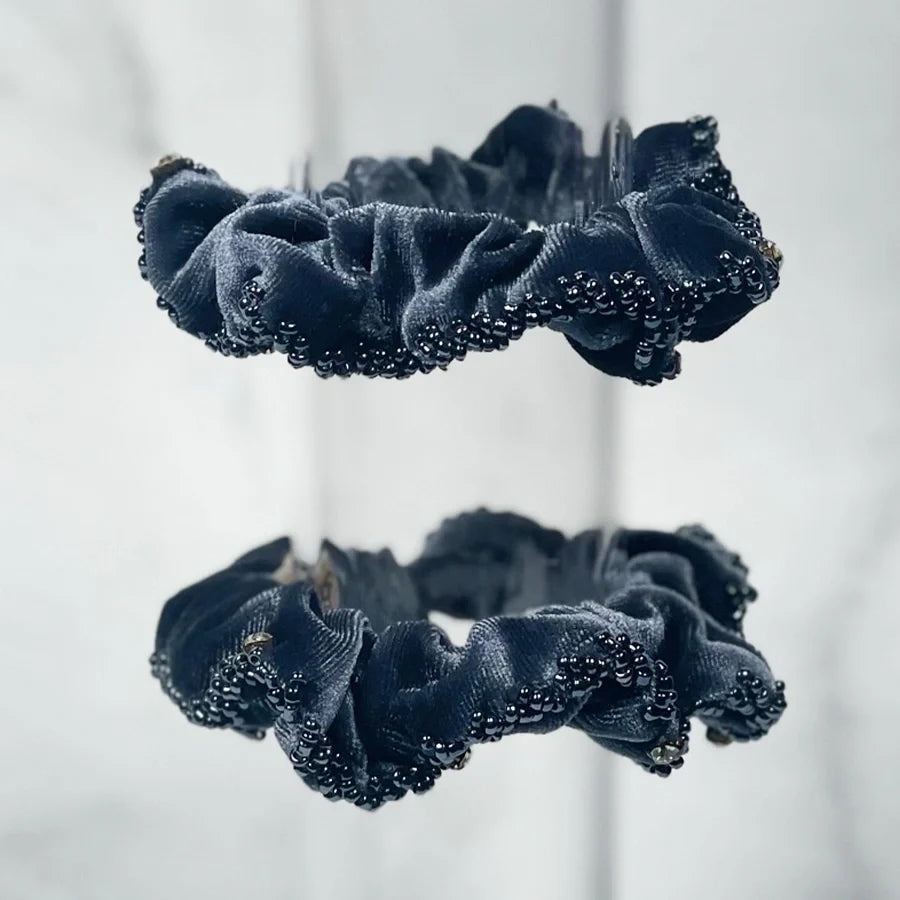 Blue crystal studded hair ties with decorative beads perfect for stylish hair accessories