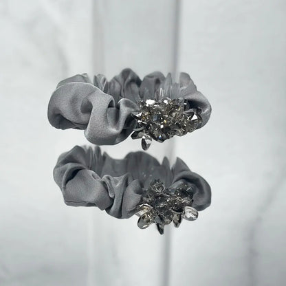 Gray fabric crystal studded hair ties with decorative clear crystal clusters for stylish hair accessories
