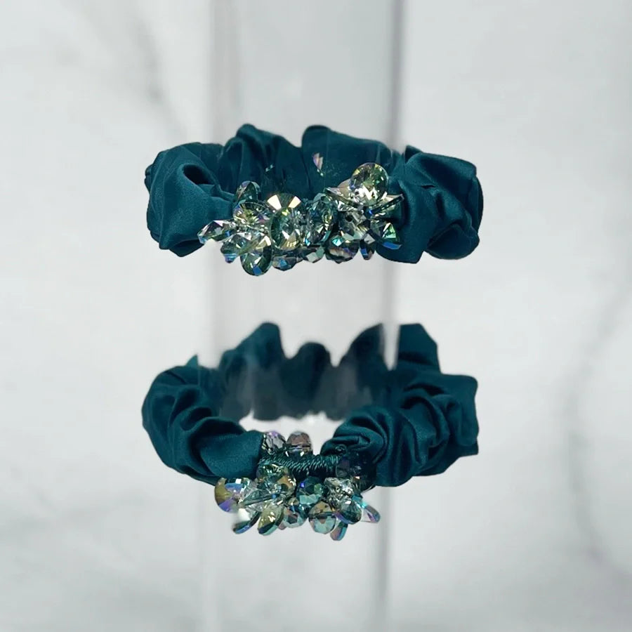 Blue crystal studded hair ties with sparkling decorative beads perfect for stylish hair accessories