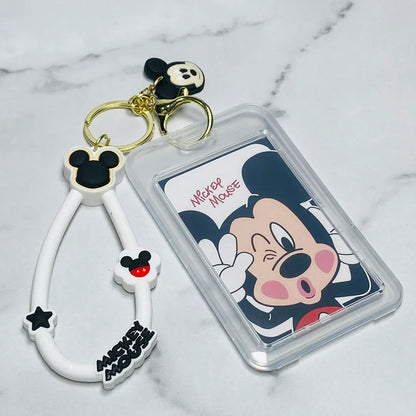 Disney tag key chains featuring Mickey Mouse designs with a clear ID holder and decorative charms