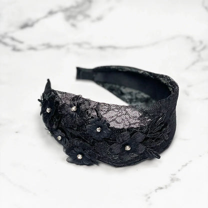 Elegant broad lace hairbands for women in black with floral embellishments and rhinestone accents