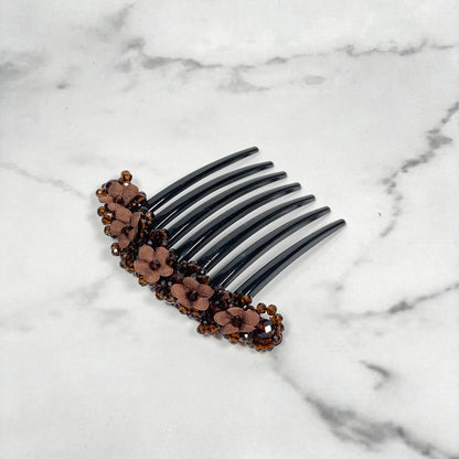 Brown floral beaded hair comb clips with flower embellishments on black comb base