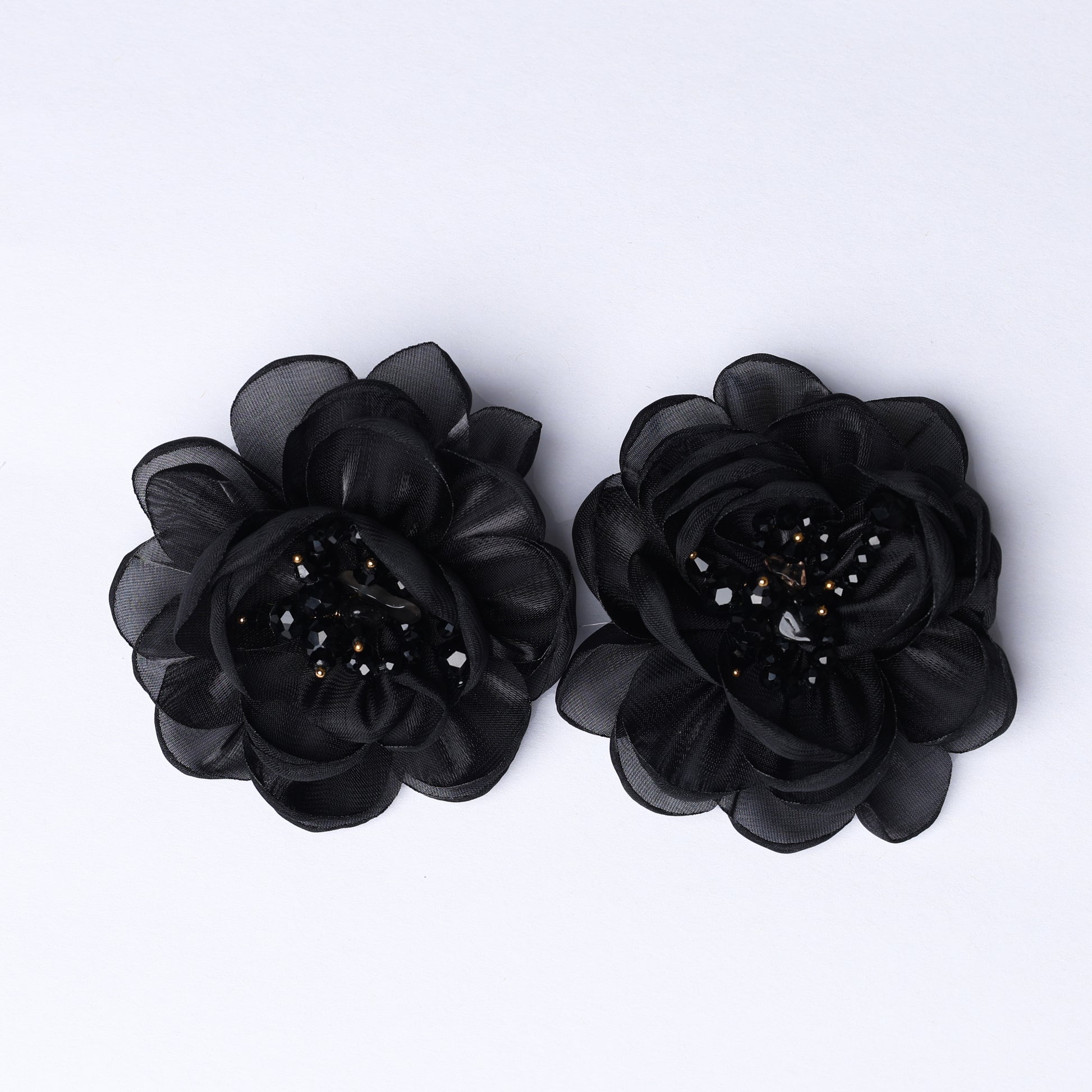 Black floral organza hair pins with layered petals and bead detailing for elegant hairstyles