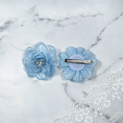 Blue floral organza hair pins with delicate layered petals and metal clip backing