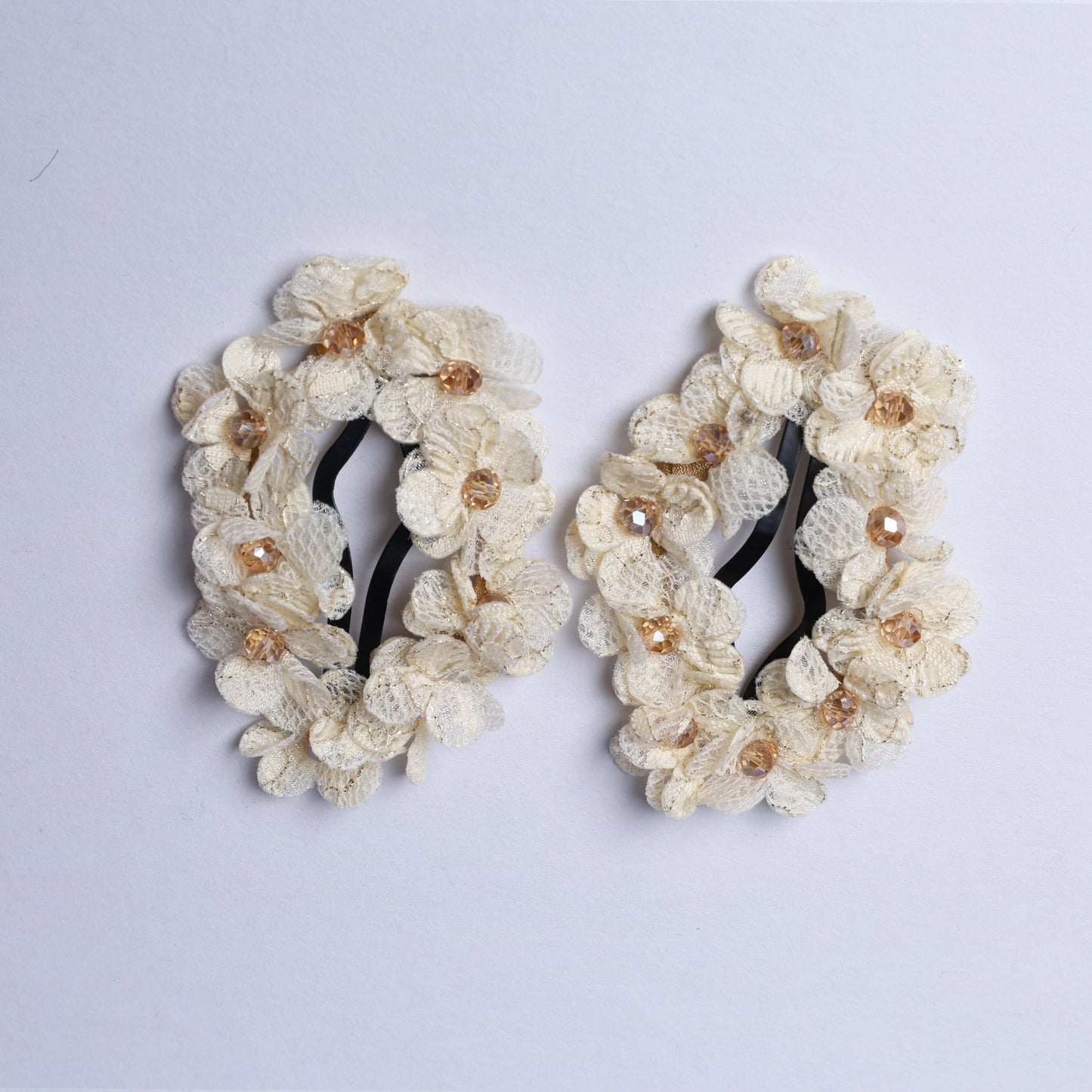 Pair of flower crystal hair pins with delicate white fabric flowers and light brown crystal centers