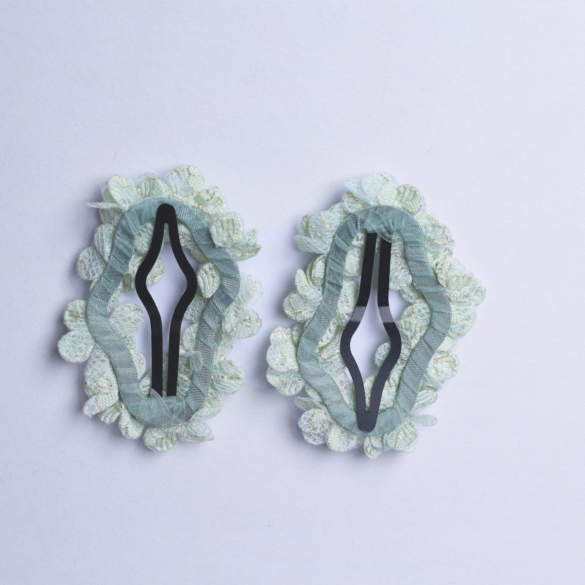Pair of delicate flower crystal hair pins with light blue lace petals design