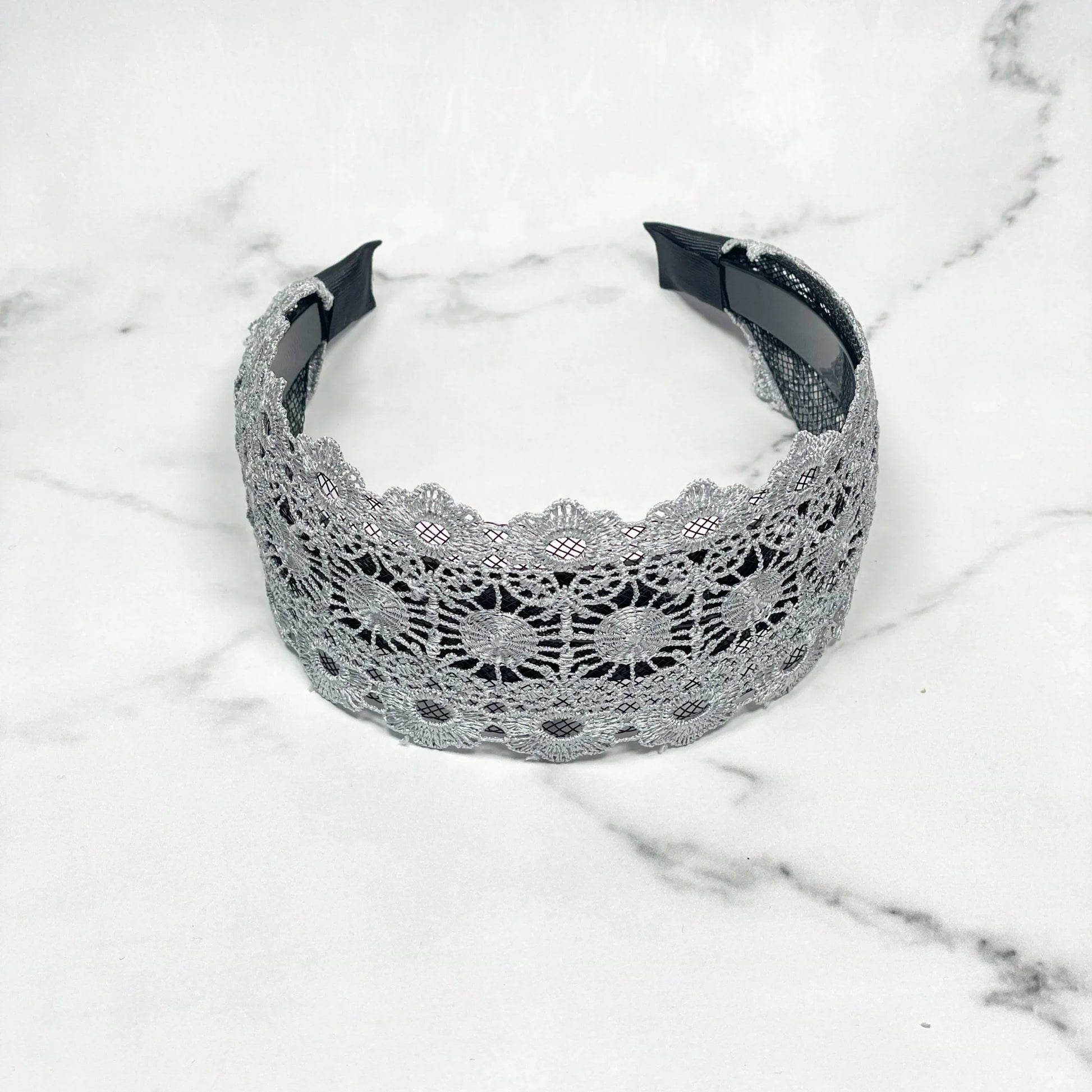 Grey lacy hairband with intricate floral lace design for elegant styling