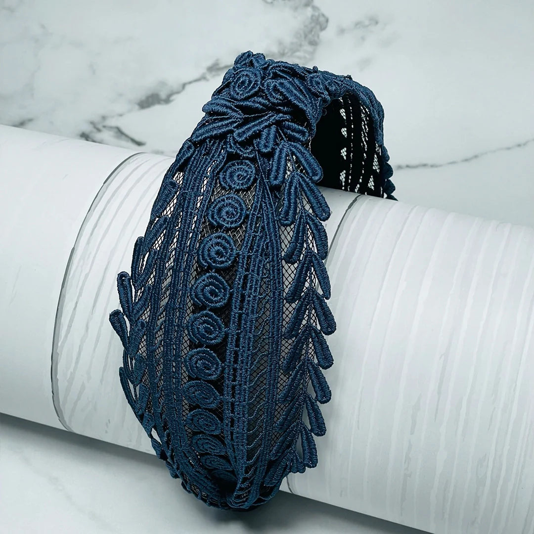 Navy blue lace knotted hairbands with intricate floral and geometric patterns on white background