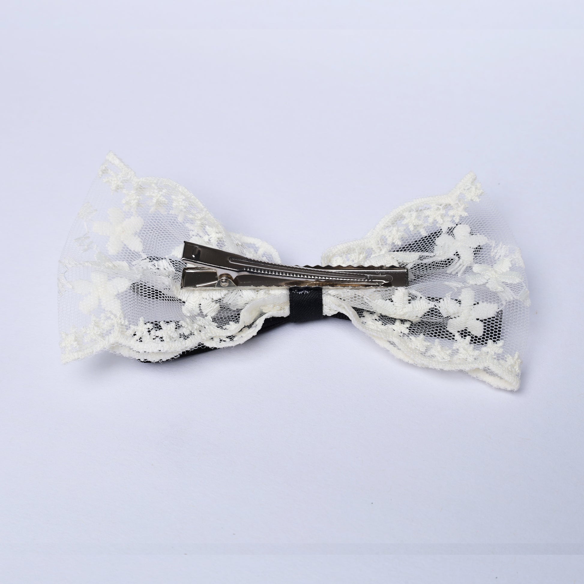 White Lacy Bows with Ribbon featuring floral lace design and metal clip for hair styling