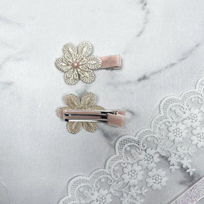 Lacy Flower Alligator Hair Pins with Beads in beige with pink bead embellishments on a marble and lace background
