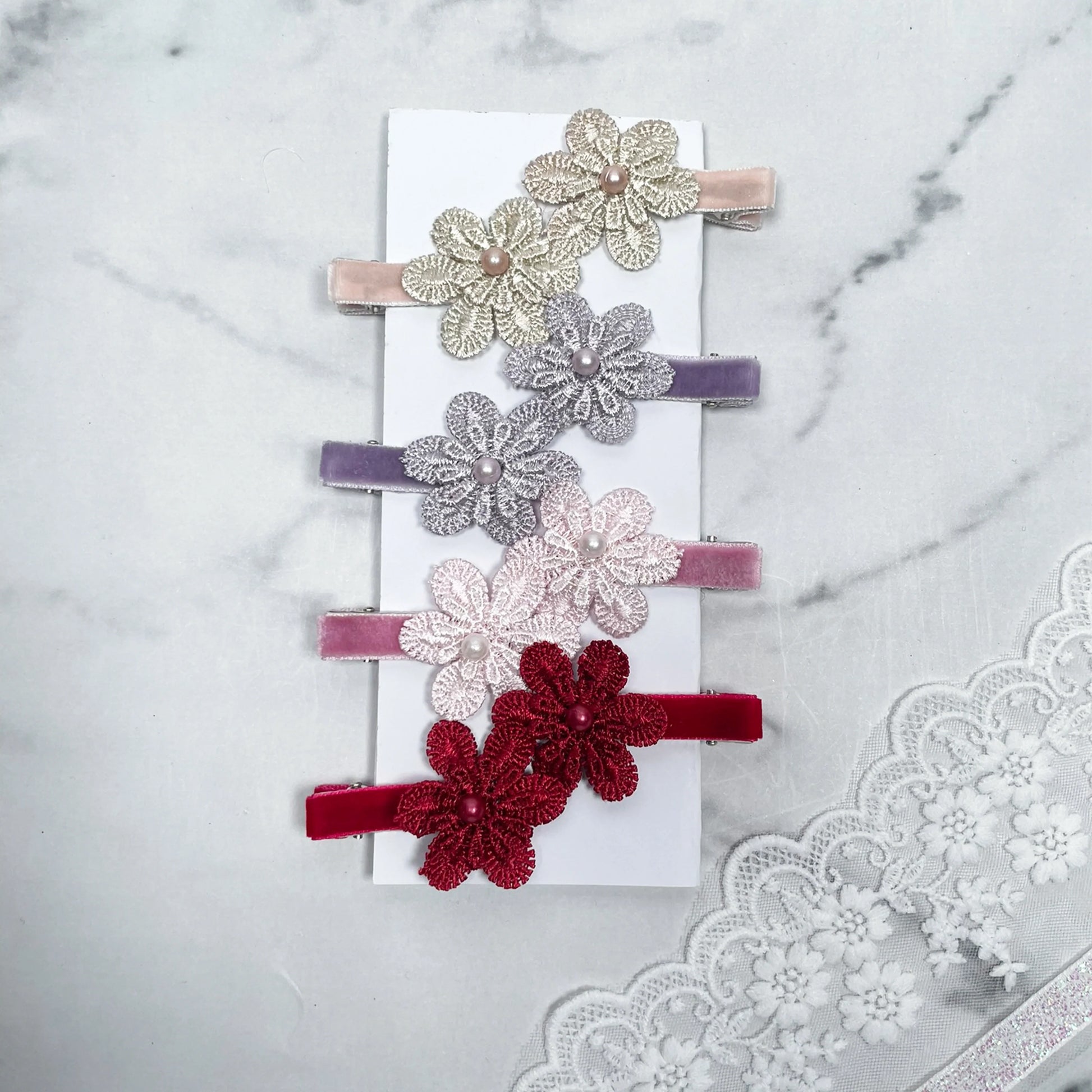 Lacy Flower Alligator Hair Pins with Beads in cream, lavender, pink, and red colors on velvet clips