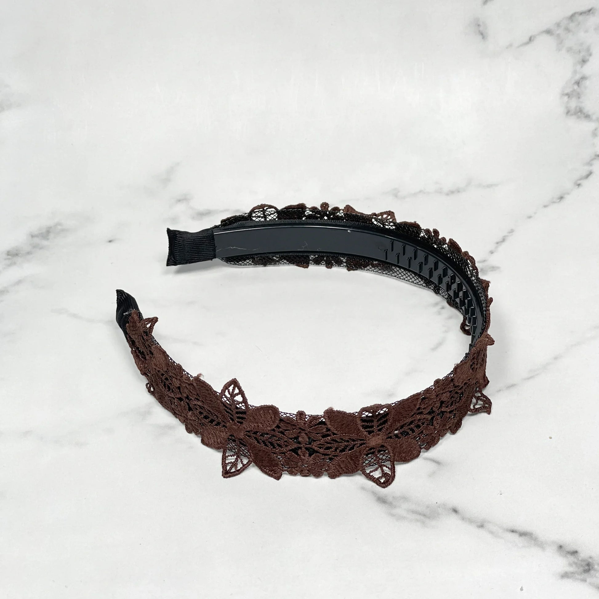 Medium broad colored hair bands with brown lace floral design on black plastic base